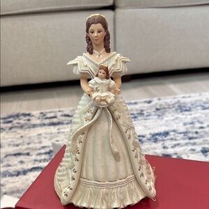 Elegant White and Gold Porcelain Doll